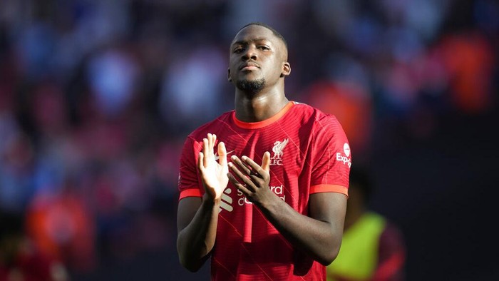 Liverpools Ibrahima Konate applauds fans at the end of the English FA Cup semifinal soccer match between Manchester City and Liverpool at Wembley stadium in London, Saturday, April 16, 2022. (AP Photo/Frank Augstein)