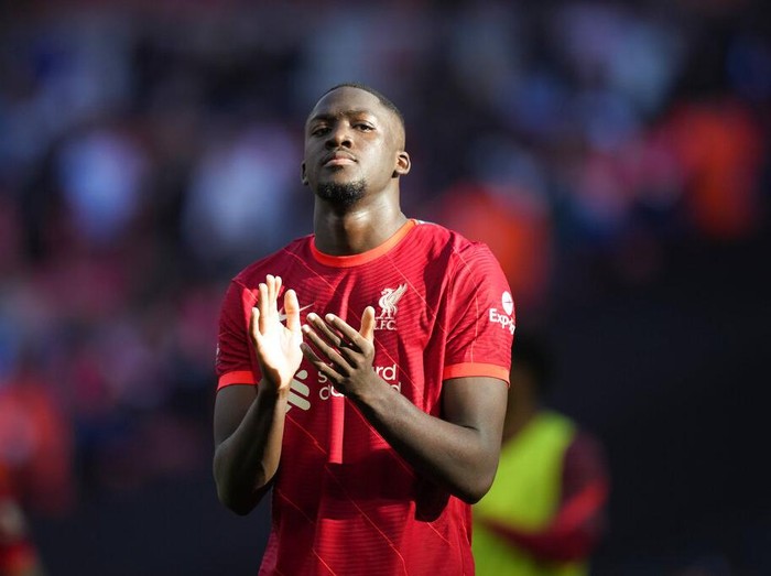 Liverpool's Ibrahima Konate applauds fans at the end of the English FA Cup semifinal soccer match between Manchester City and Liverpool at Wembley stadium in London, Saturday, April 16, 2022. (AP Photo/Frank Augstein)