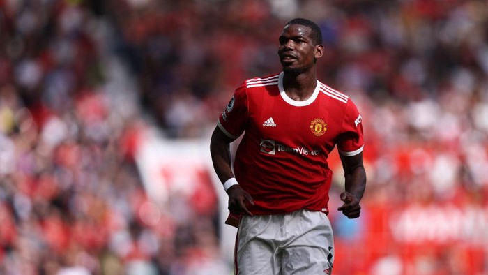 Paul Pogba MANCHESTER, ENGLAND - APRIL 16: Paul Pogba of Manchester United in action during the Premier League match between Manchester United and Norwich City at Old Trafford on April 16, 2022 in Manchester, England. (Photo by Naomi Baker/Getty Images)