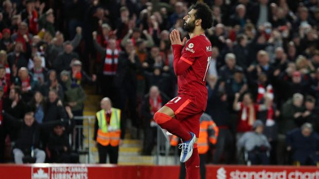 Soccer Football - Premier League - Liverpool v Manchester United - Anfield, Liverpool, Britain - April 19, 2022 Liverpool's Mohamed Salah celebrates scoring their fourth goal REUTERS/Phil Noble EDITORIAL USE ONLY. No use with unauthorized audio, video, data, fixture lists, club/league logos or 'live' services. Online in-match use limited to 75 images, no video emulation. No use in betting, games or single club /league/player publications.  Please contact your account representative for further details.