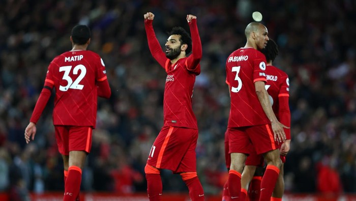 LIVERPOOL, ENGLAND - APRIL 19: Mohamed Salah of Liverpool celebrates scoring their sides fourth goal during the Premier League match between Liverpool and Manchester United at Anfield on April 19, 2022 in Liverpool, England. (Photo by Clive Brunskill/Getty Images)