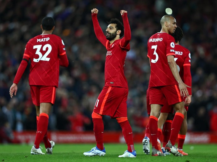 LIVERPOOL, ENGLAND - APRIL 19: Mohamed Salah of Liverpool celebrates scoring their sides fourth goal during the Premier League match between Liverpool and Manchester United at Anfield on April 19, 2022 in Liverpool, England. (Photo by Clive Brunskill/Getty Images)