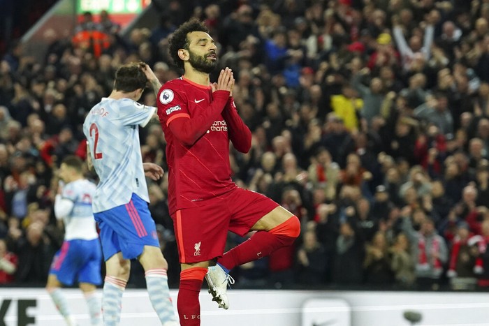 Mohamed Salah Liverpool's Mohamed Salah celebrates after scoring his side's fourth goal during the English Premier League soccer match between Liverpool and Manchester United at Anfield stadium in Liverpool, England, Tuesday, April 19, 2022. (AP Photo/Jon Super)