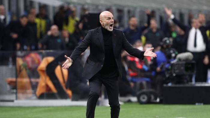 MILAN, ITALY - APRIL 19: Stefano Pioli, Manager of AC Milan, reacts during the Coppa Italia Semi Final 2nd Leg match between FC Internazionale v AC Milan at Giuseppe Meazza Stadium on April 19, 2022 in Milan, Italy. (Photo by Marco Luzzani/Getty Images)