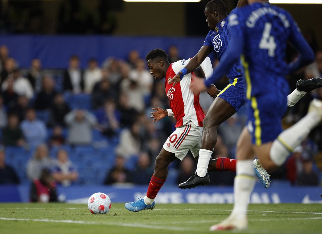 Soccer Football - Premier League - Chelsea v Arsenal - Stamford Bridge, London, Britain - April 20, 2022  Arsenal's Eddie Nketiah scores their first goal Action Images via Reuters/John Sibley EDITORIAL USE ONLY. No use with unauthorized audio, video, data, fixture lists, club/league logos or 'live' services. Online in-match use limited to 75 images, no video emulation. No use in betting, games or single club /league/player publications.  Please contact your account representative for further details.