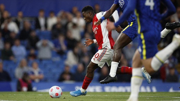 Arsenal Permalukan Chelsea di Stamford Bridge Soccer Football - Premier League - Chelsea v Arsenal - Stamford Bridge, London, Britain - April 20, 2022 Arsenal's Eddie Nketiah scores their first goal Action Images via Reuters/John Sibley EDITORIAL USE ONLY. No use with unauthorized audio, video, data, fixture lists, club/league logos or 'live' services. Online in-match use limited to 75 images, no video emulation. No use in betting, games or single club /league/player publications. Please contact your account representative for further details.