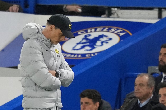 Chelseas head coach Thomas Tuchel looks down as he walks in the technical area during the English Premier League soccer match between Chelsea and Arsenal at Stamford Bridge in London, Wednesday, April 20, 2022. (AP Photo/Frank Augstein)