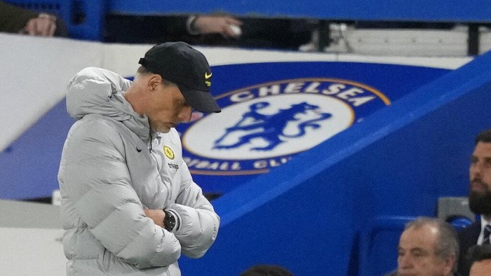 Chelseas head coach Thomas Tuchel looks down as he walks in the technical area during the English Premier League soccer match between Chelsea and Arsenal at Stamford Bridge in London, Wednesday, April 20, 2022. (AP Photo/Frank Augstein)