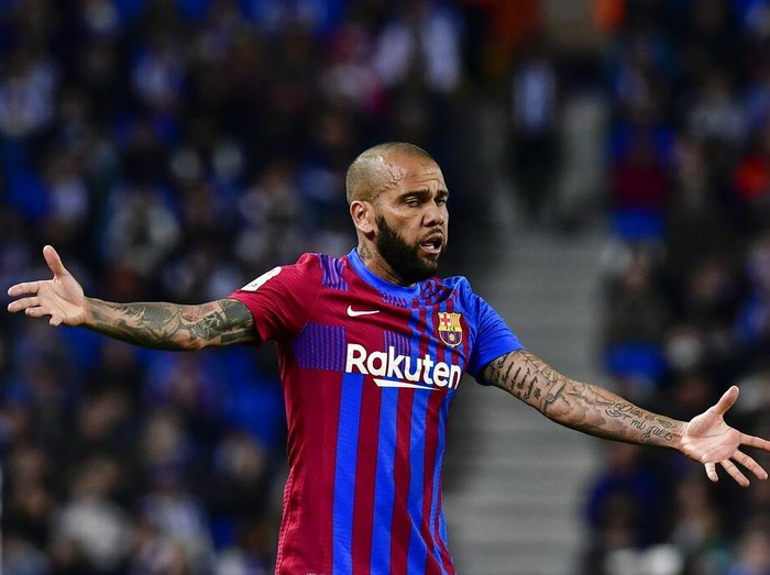 Barcelona's Dani Alves reacts during a Spanish La Liga soccer match between Real Sociedad and FC Barcelona at the Reale Arena stadium in San Sebastian, Spain, Thursday, April 21, 2022. (AP Photo/Alvaro Barrientos)
