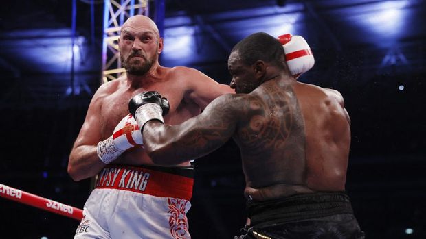 Boxing - Tyson Fury v Dillian Whyte - WBC World Heavyweight Title - Wembley Stadium, London, Britain - April 23, 2022  Tyson Fury in action against Dillian Whyte Action Images via Reuters/Andrew Couldridge
