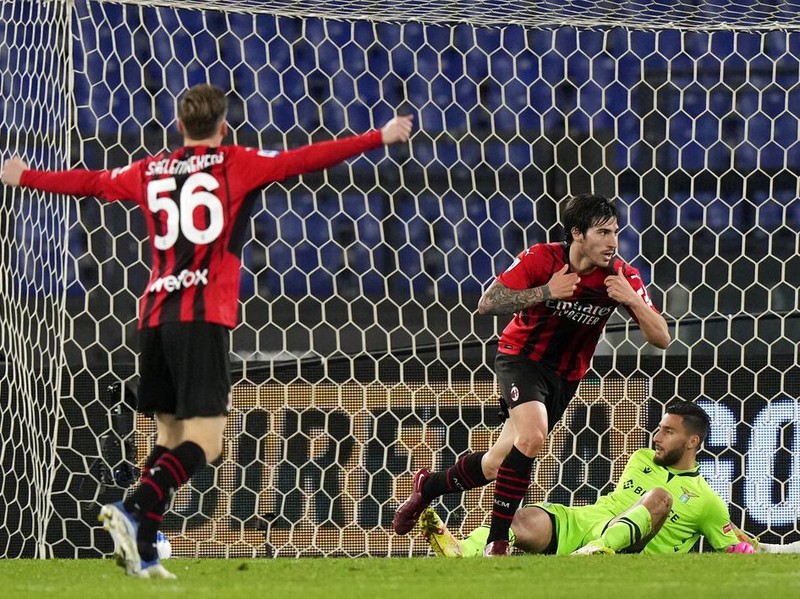 Lazio's Ciro Immobile, centre, scores his side's opening goal during the Serie A soccer match between Lazio and AC Milan, at Rome's Olympic Stadium, Italy, Sunday, April 24, 2022. (AP Photo/Andrew Medichini)