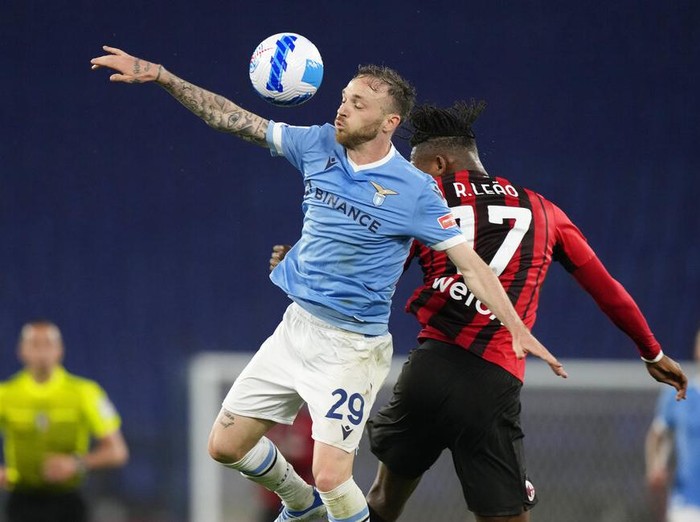 Lazio's Ciro Immobile, centre, scores his side's opening goal during the Serie A soccer match between Lazio and AC Milan, at Rome's Olympic Stadium, Italy, Sunday, April 24, 2022. (AP Photo/Andrew Medichini)