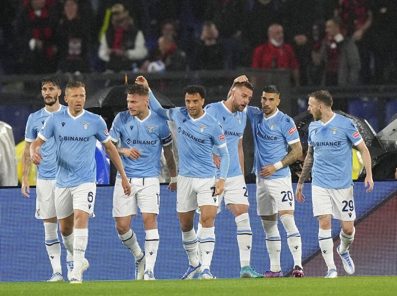 Lazio's Ciro Immobile, centre, scores his side's opening goal during the Serie A soccer match between Lazio and AC Milan, at Rome's Olympic Stadium, Italy, Sunday, April 24, 2022. (AP Photo/Andrew Medichini)