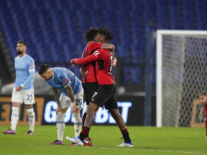 Lazio's Ciro Immobile, centre, scores his side's opening goal during the Serie A soccer match between Lazio and AC Milan, at Rome's Olympic Stadium, Italy, Sunday, April 24, 2022. (AP Photo/Andrew Medichini)