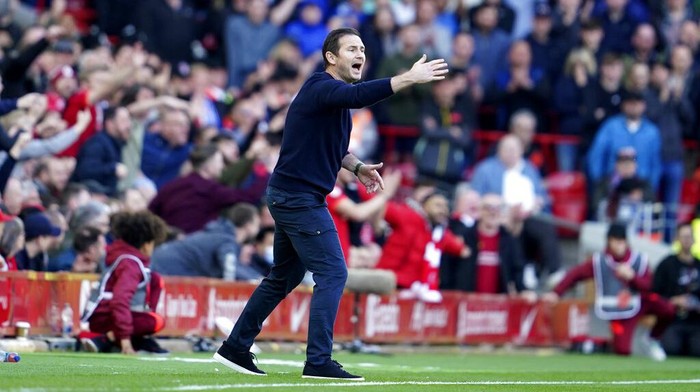 Evertons head coach Frank Lampard gestures during the English Premier League soccer match between Liverpool and Everton at Anfield stadium in Liverpool, England, Sunday, April 24, 2022. (AP Photo/Jon Super)