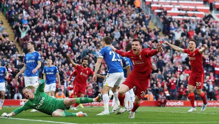 Soccer Football - Premier League - Liverpool v Everton - Anfield, Liverpool, Britain - April 24, 2022  Liverpools Andrew Robertson celebrates scoring their first goal REUTERS/Phil Noble EDITORIAL USE ONLY. No use with unauthorized audio, video, data, fixture lists, club/league logos or live services. Online in-match use limited to 75 images, no video emulation. No use in betting, games or single club /league/player publications.  Please contact your account representative for further details.