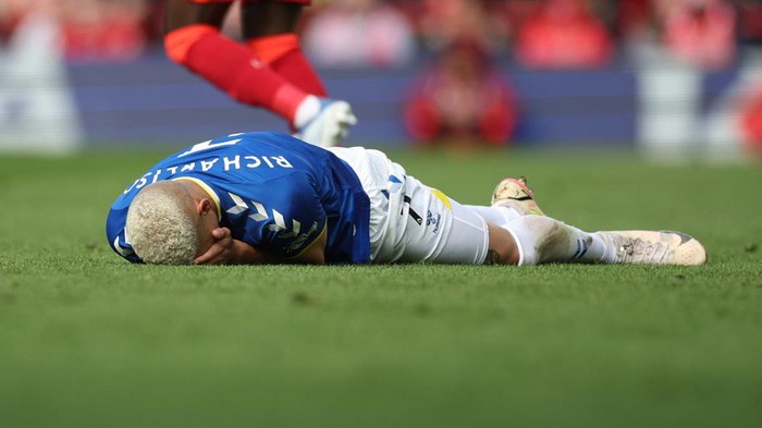 Soccer Football - Premier League - Liverpool v Everton - Anfield, Liverpool, Britain - April 24, 2022  Evertons Richarlison goes down REUTERS/Phil Noble EDITORIAL USE ONLY. No use with unauthorized audio, video, data, fixture lists, club/league logos or live services. Online in-match use limited to 75 images, no video emulation. No use in betting, games or single club /league/player publications.  Please contact your account representative for further details.