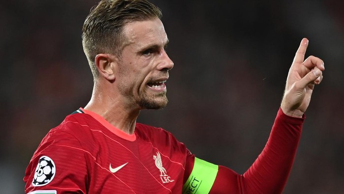 LIVERPOOL, ENGLAND - SEPTEMBER 15:  Jordan Hendreson of Liverpool gestures during the UEFA Champions League group B match between Liverpool FC and AC Milan at Anfield on September 15, 2021 in Liverpool, England. (Photo by Shaun Botterill/Getty Images)