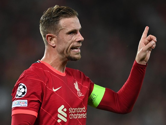 LIVERPOOL, ENGLAND - SEPTEMBER 15:  Jordan Hendreson of Liverpool gestures during the UEFA Champions League group B match between Liverpool FC and AC Milan at Anfield on September 15, 2021 in Liverpool, England. (Photo by Shaun Botterill/Getty Images)