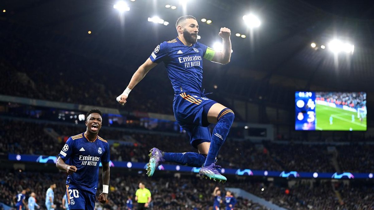 Karim Benzema mencetak gol ke gawang Manchester City. (Foto: Getty Images/David Ramos)