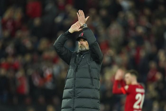 Liverpools manager Jurgen Klopp applauds fans at the end of the Champions League semi final, first leg soccer match between Liverpool and Villarreal at Anfield stadium in Liverpool, England, Wednesday, April 27, 2022. (AP Photo/Jon Super)
