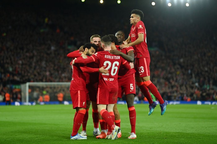 LIVERPOOL, ENGLAND - APRIL 27: Jordan Henderson of Liverpool celebrates with team mates after their teams first goal which came through a Geronimo Rulli of Villarreal CF (not pictured) own goal during the UEFA Champions League Semi Final Leg One match between Liverpool and Villarreal at Anfield on April 27, 2022 in Liverpool, England. (Photo by David Ramos/Getty Images)