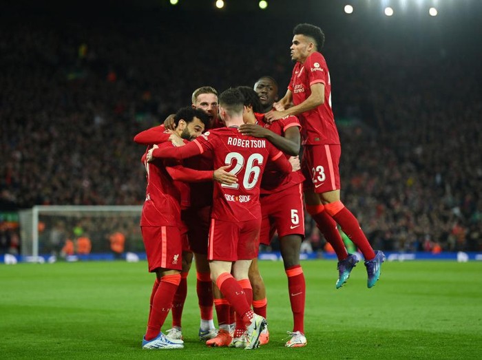 LIVERPOOL, ENGLAND - APRIL 27: Jordan Henderson of Liverpool celebrates with team mates after their team's first goal which came through a Geronimo Rulli of Villarreal CF (not pictured) own goal during the UEFA Champions League Semi Final Leg One match between Liverpool and Villarreal at Anfield on April 27, 2022 in Liverpool, England. (Photo by David Ramos/Getty Images)