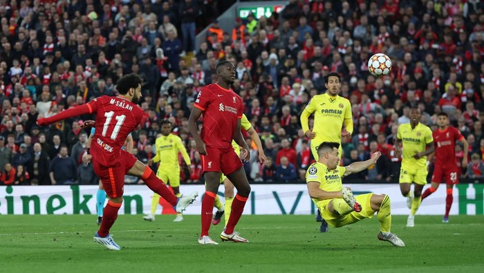 Soccer Football - Champions League - Semi Final - First Leg - Liverpool v Villarreal - Anfield, Liverpool, Britain - April 27, 2022 Liverpools Mohamed Salah shoots at goal REUTERS/Phil Noble