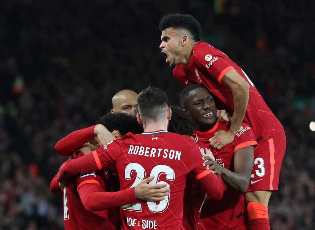 Soccer Football - Champions League - Semi Final - First Leg - Liverpool v Villarreal - Anfield, Liverpool, Britain - April 27, 2022 Liverpool's Jordan Henderson celebrates with Luis Diaz and teammates after Villarreal's Pervis Estupinan scored Liverpool's first with an own goal after deflecting a shot by Henderson Action Images via Reuters/Carl Recine