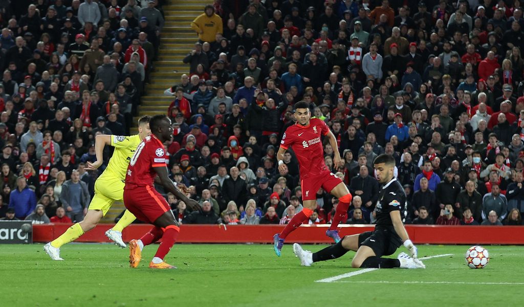 Soccer Football - Champions League - Semi Final - First Leg - Liverpool v Villarreal - Anfield, Liverpool, Britain - April 27, 2022 Liverpool's Jordan Henderson celebrates with Luis Diaz and teammates after Villarreal's Pervis Estupinan scored Liverpool's first with an own goal after deflecting a shot by Henderson Action Images via Reuters/Carl Recine