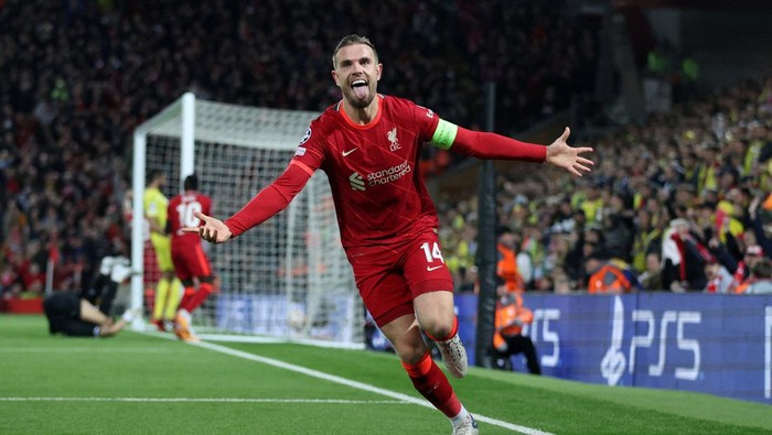 Soccer Football - Champions League - Semi Final - First Leg - Liverpool v Villarreal - Anfield, Liverpool, Britain - April 27, 2022 Liverpools Jordan Henderson celebrates with Luis Diaz and teammates after Villarreals Pervis Estupinan scored Liverpools first with an own goal after deflecting a shot by Henderson Action Images via Reuters/Carl Recine