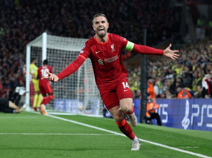 Soccer Football - Champions League - Semi Final - First Leg - Liverpool v Villarreal - Anfield, Liverpool, Britain - April 27, 2022 Liverpool's Jordan Henderson celebrates with Luis Diaz and teammates after Villarreal's Pervis Estupinan scored Liverpool's first with an own goal after deflecting a shot by Henderson Action Images via Reuters/Carl Recine