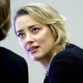Actress Amber Heard appears in the courtroom during a hearing at the Fairfax County Circuit Court in Fairfax, Va., Tuesday April 19, 2022. Actor Johnny Depp sued his ex-wife Heard for libel in Fairfax County Circuit Court after she wrote an op-ed piece in The Washington Post in 2018 referring to herself as a 