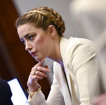 Actress Amber Heard appears in the courtroom during a hearing at the Fairfax County Circuit Court in Fairfax, Va., Tuesday April 19, 2022. Actor Johnny Depp sued his ex-wife Heard for libel in Fairfax County Circuit Court after she wrote an op-ed piece in The Washington Post in 2018 referring to herself as a 
