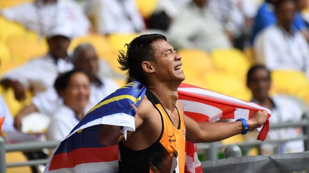Rayzam Shah of Malaysia celebrates his win in the 110M hurdles final of the 29th Southeast Asian Games (SEA Games) in Kuala Lumpur on August 26, 2017. (Photo by ADEK BERRY / AFP)