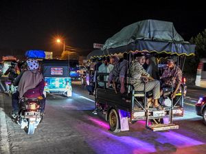 Mereka yang Mudik dengan Kendaraan Bak Terbuka