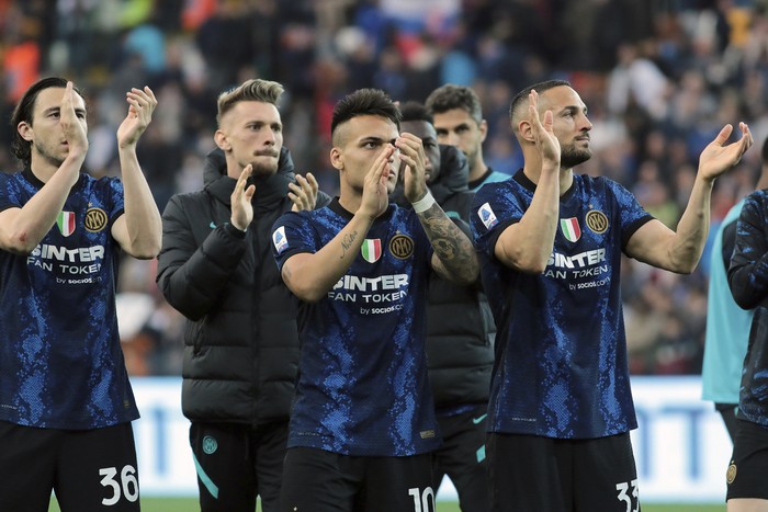 Inters Lautaro Martinez, foreground center, applauds fans at the end of the Serie A soccer match between Udinese and Inter Milan, at the Udine Friuli stadium, Italy, Sunday, May 1, 2022. Inter won 2-1.  (Andrea Bressanutti/LaPresse via AP)