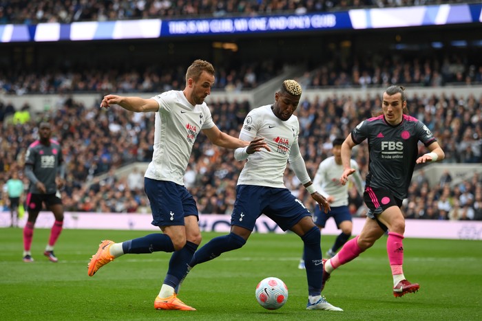 LONDON, ENGLAND - MAY 01: Harry Kane and Emerson Royal of Tottenham Hotspur run with the ball from Caglar Soyuncu of Leicester City during the Premier League match between Tottenham Hotspur and Leicester City at Tottenham Hotspur Stadium on May 01, 2022 in London, England. (Photo by Mike Hewitt/Getty Images)