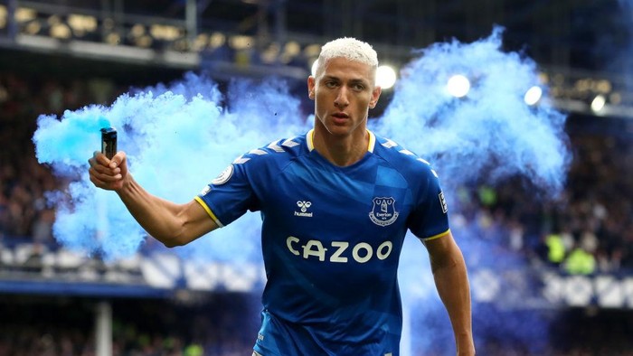 LIVERPOOL, ENGLAND - MAY 01: Richarlison of Everton celebrates with a flare after scoring their teams first goal during the Premier League match between Everton and Chelsea at Goodison Park on May 01, 2022 in Liverpool, England. (Photo by Jan Kruger/Getty Images)
