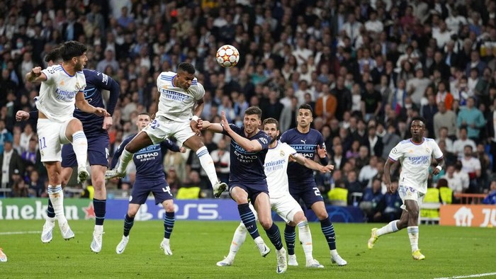 Real Madrids Rodrygo scores his sides second goal during the Champions League semi final, second leg, soccer match between Real Madrid and Manchester City at the Santiago Bernabeu stadium in Madrid, Spain, Wednesday, May 4, 2022. (AP Photo/Bernat Armangue)