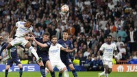 Gol Rodrygo menghapus keunggulan agregat Man City atas Real Madrid. Foto: AP/Bernat Armangue