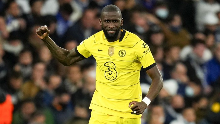Chelseas Antonio Rudiger celebrates after he scored his sides second goal during the Champions League, quarterfinal second leg soccer match between Real Madrid and Chelsea at the Santiago Bernabeu stadium in Madrid, Spain, Tuesday, April 12, 2022. (AP Photo/Manu Fernandez)