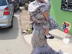 Viral Wanita Ini Pakai Baju Lebaran Heboh ala Mermaid, Bisa Sapu Jalanan