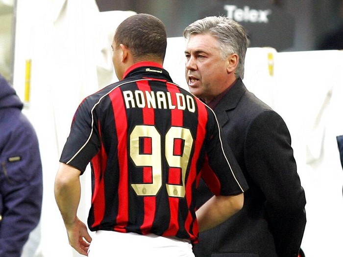 AC Milan coach Carlo Ancelotti. right,talks with  Brazilian soccer star Ronaldo duringt the Italian first division soccer match between AC Milan and Livorno at the San Siro stadium in Milan, Italy, Sunday, Feb. 11, 2007. (AP Photo/Antonio Calanni)