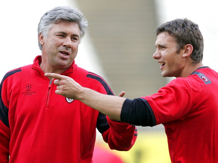 AC Milan's coach Carlo Ancelotti, left, speaks with his star striker Andriy Shevchenko during a team training session at the Ataturk Olympic Stadium in Istanbul, Turkey Tuesday May 24, 2005. AC Milan will play Liverpool in the UEFA Champions League Final in Istanbul on Wednesday May 25. (AP Photo/Dusan Vranic)