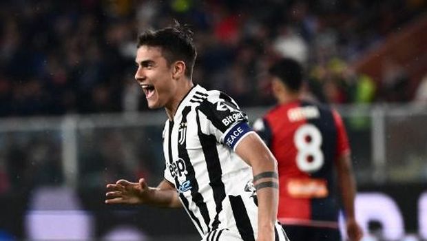 Juventus' Argentine forward Paulo Dybala celebrates after opening the scoring during the Italian Serie A football match between Genoa and Juventus on May 6, 2022 at the  Luigi-Ferraris stadium in Genoa. (Photo by Marco BERTORELLO / AFP)