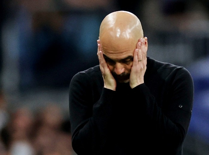 FILE PHOTO: Soccer Football - Champions League - Semi Final - Second Leg - Real Madrid v Manchester City - Santiago Bernabeu, Madrid, Spain - May 4, 2022 Manchester City manager Pep Guardiola Action Images via Reuters/Carl Recine/File Photo
