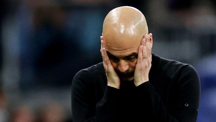 FILE PHOTO: Soccer Football - Champions League - Semi Final - Second Leg - Real Madrid v Manchester City - Santiago Bernabeu, Madrid, Spain - May 4, 2022 Manchester City manager Pep Guardiola Action Images via Reuters/Carl Recine/File Photo