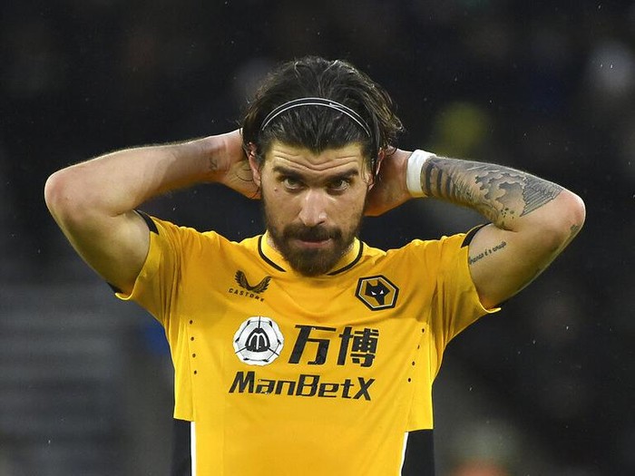 Wolverhampton Wanderers' Ruben Neves during the English Premier League soccer match between Wolverhampton Wanderers and Leicester City at Molineux stadium in Wolverhampton, England, Sunday, Feb. 20, 2022. (AP Photo/Rui Vieira)