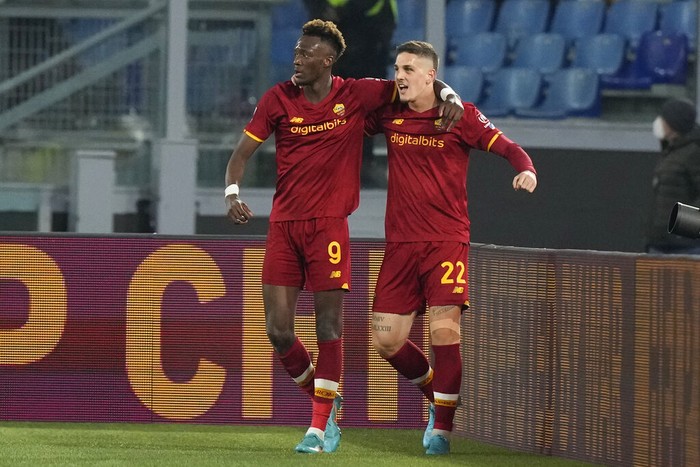 Romas Tammy Abraham, left, celebrates with his teammate Romas Nicolo Zaniolo after he scored his sides first goal during a Serie A soccer match between Roma and Atalanta, at Romes Olympic Stadium, Saturday, March 5, 2022. (AP Photo/Andrew Medichini)